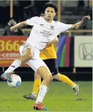  ?? Www.mphotograp­hic.co.uk ?? ●●Lewis Montrose in action against Boston United at the weekend