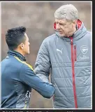  ??  ?? SHAKE ON IT: Arsene Wenger and Alexis Sanchez yesterday