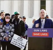  ?? Tribune News Service ?? Gun violence survivors and family members gather in front of the Supreme Court ahead of oral argument in NYSRPA v. Bruen last year in Washington, D.C.