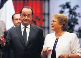  ?? AP ?? El presidente francés, François Hollande, se reunió con su homóloga chilena, Michelle Bachelet, en el Palacio de La Moneda.