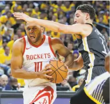  ?? Carlos Avila Gonzalez / The Chronicle ?? The Rockets’ Eric Gordon tries to get past the Warriors’ Klay Thompson in the third quarter of Game 4 at Oracle Arena.