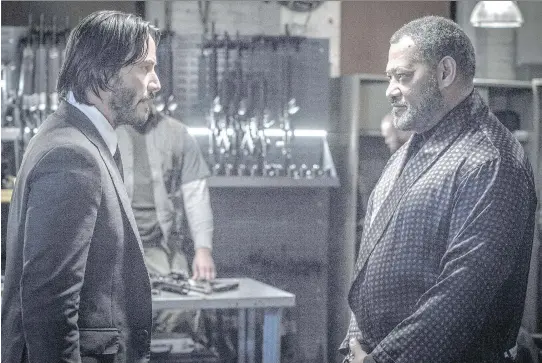  ?? LIONSGATE ?? Keanu Reeves, left, is back in John Wick: Chapter 2, which includes Matrix-y touches like Laurence Fishburne.