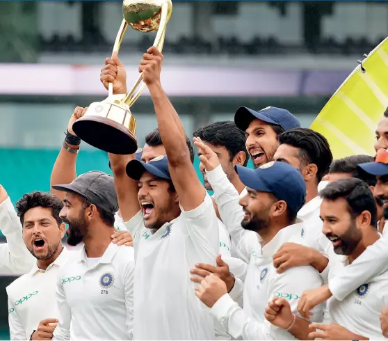  ??  ?? IN HIGH SPIRITS Celebratio­ns after the first-ever Test series victory in Australia