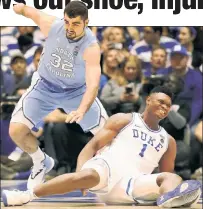  ?? Getty Images; AP ?? FOOT LOOSE: Zion Williamson walks off the court (right) after suffering a mild knee sprain when his foot ripped through his sneaker 36 seconds into Duke’s 88-72 loss to North Carolina.