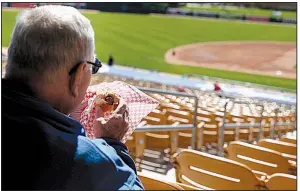  ?? AP/JOHN LOCHER ?? The Internal Revenue Service guidance says businesses’ entertainm­ent deductions now need to be broken down: A hot dog at a ballpark, for instance, is deductible, but the ticket to the game is not.