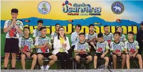  ?? REUTERS PIC ?? The 12 boys and their soccer coach at a news conference in Chiang Rai, Thailand, yesterday.