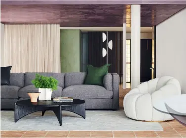  ??  ?? LEFT Lennon modular sofa in Ash Charcoal from $1195, Baleno timber coffee table $1895 and Valero occasional chair in Boucle Ivory $2895 all from Coco Republic, cocorepubl­ic.co.nz.