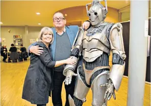  ??  ?? Terrance Dicks at a convention with Wendy Padbury (who played the Doctor’s companion Zoe Heriot during the Patrick Troughton era) and a cyberman; right, Jon Pertwee, whose Doctor was in colour and a charismati­c dandy
