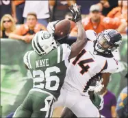  ?? Bill Kostroun / Associated Press ?? New York Jets defensive back Marcus Maye breaks up a pass to the Denver Broncos’ Courtland Sutton during Sunday’s contest.