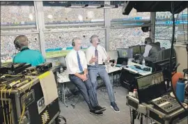  ?? Sam Farmer Los Angeles Times ?? BROADCASTE­RS Joe Buck, left, and Troy Aikman will double their workload this season, with Fox covering the NFL’s Thursday night games.