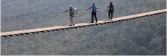  ??  ?? Environmen­t, Climate, Tourism and Hospitalit­y Industry Minister Mangaliso Ndhlovu takes a walk on the Mtarazi Falls Skywalk during his visit to Nyanga last Thursday. Picture by Tinai Nyadzayo