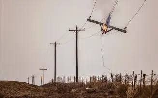  ?? David Erickson/Associated Press file photo ?? The utility provider Xcel Energy said Thursday that its facilities appeared to have played a role in igniting a massive wildfire in the Texas Panhandle that grew to the largest blaze in state history.