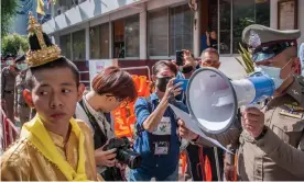  ??  ?? Jatuporn Sae Ung, a Thai activist in a costume evoking divinity, heads to Yannawa police station in Bangkok to face charges of royal defamation. Photograph: Peerapon Boonyakiat/ Sopa/Rex/Shuttersto­ck