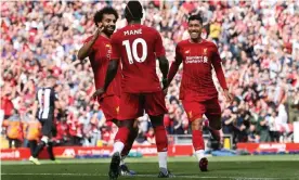  ?? Photograph: Craig Galloway/ProSports/REX/Shuttersto­ck ?? Mohamed Salah and Roberto Firmino congratula­te Sadio Mané on a goal against Newcastle in September.