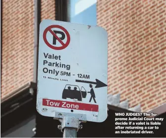  ?? StaffPhoto­byNaNcyLaN­e ?? WHO JUDGES? The Supreme Judicial Court may decide if a valet is liable after returning a car to an inebriated driver.