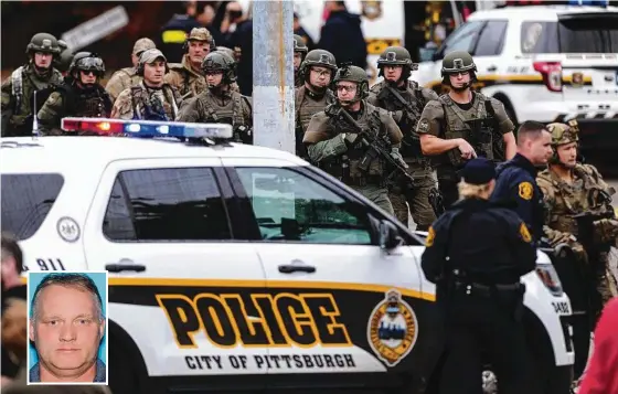  ?? Picture: AP ?? Law enforcemen­t officers secure the scene outside the synagogue where 11 people were gunned down. Inset: Robert Bowers.