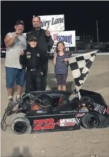  ?? MERRITTVIL­LE SPEEDWAY ?? Ed Crozier and Nigel Pendykoski celebrate the wins in kart racing at Merrittvil­le Speedway earlier this week.