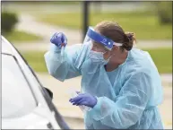  ?? H John Voorhees III / Hearst Connecticu­t Media ?? Heidi Bettcher, RN, Public Health Nurse, explains how to do a self administer­ed COVID test during the first day of the New Milford Health Department’s COVID-19 drive-thru testing site at John Pettibone Community Center on Aug. 11.