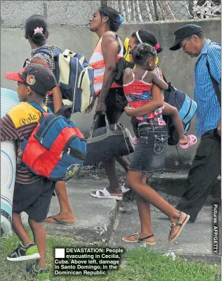  ??  ?? ®Ê DEVASTATIO­N: People evacuating in Cecilia, Cuba. Above left, damage in Santo Domingo, in the Dominican Republic