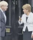  ??  ?? 0 Nicola Sturgeon with Boris Johnson at Bute House