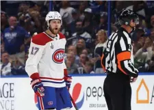  ?? GETTY IMAGES ?? REALLY? Josh Anderson of Montreal disputes a penalty call with referee Dan O'Rourke in Game Five of the 2021 NHL Stanley Cup Final on July 7 in Tampa.