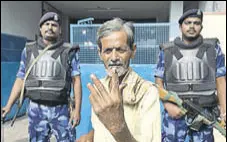  ?? AP ?? A man shows his inked finger after voting in Hyderabad, Telangana; 119 constituen­cies from the state went to polls.