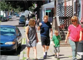  ?? DIGITAL FIRST MEDIA FILE PHOTO ?? Community members walk in Pottstown as part of The Mercury Mile. The weekly activity returns for another year beginning this Wednesday from Smith Family Plaza in Pottstown.