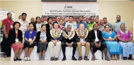  ?? Photo: Kelera Chang ?? The Assistant Minister for Agricultur­e , Viam Pillay (centre) with Internatio­nal Fund for Agricultur­al Developmen­t portfolia advisor Nigel Brett (right) and IFAD country director Ron Hartman (left) with participan­ts at the Internatio­nal Fund for...