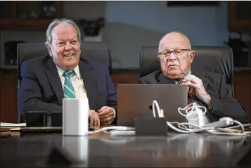  ?? BRUCE R. BENNETT / THE PALM BEACH POST ?? Legendary attorney F. Lee Bailey (right) takes part in a podcast with private investigat­or Pat McKenna at the Romano Law Group offices in Lake Worth last week. Bailey formerly lived in Manalapan.