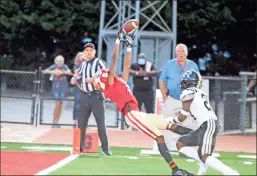  ?? Jeremy Stewart, File ?? Rome High receiver Jay Wise (left) makes a catch as he falls backward into the end zone for a touchdown in front of Rockmart’s Jojo Haynes .