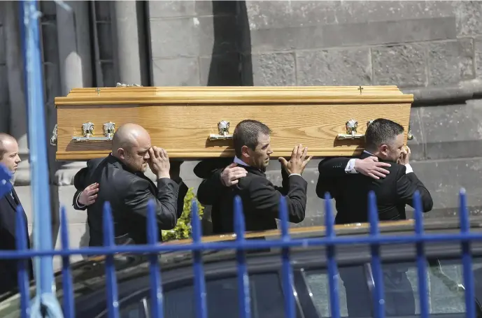  ??  ?? The coffin carrying the remains of Natalia Karaczyn is brought from Sligo Cathedral following Requiem Mass.