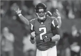  ?? STREETER LECKA, GETTY IMAGES ?? Falcons quarterbac­k Matt Ryan threw for 338 yards and three touchdowns on Saturday.