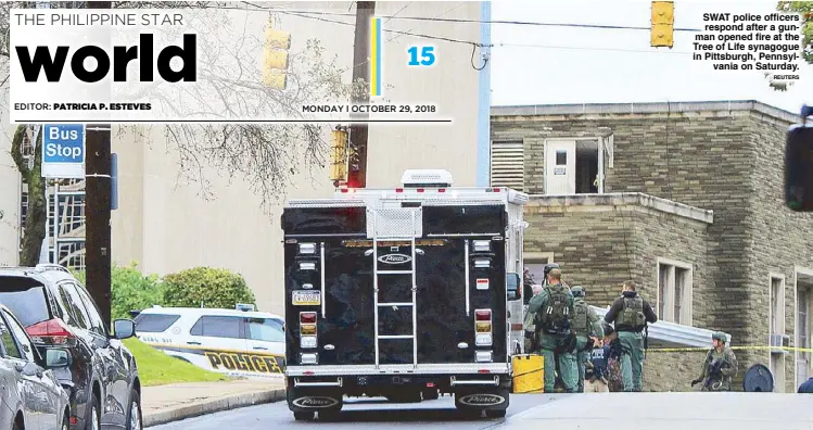  ??  ?? SWAT police officers respond after a gunman opened fire at the Tree of Life synagogue in Pittsburgh, Pennsylvan­ia on Saturday.