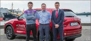  ??  ?? Rory O’Connor and Eanna Martin with Barry Murphy of the Trinity Motor Group.