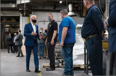  ?? The Associated Press ?? FOUNDRY: Democratic presidenti­al candidate former Vice President Joe Biden tours the Wisconsin Aluminum Foundry on Monday in Manitowoc, Wis.