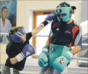  ?? Photos: Iain Ferguson, The Write Image ?? Young Lochaber boxer Max Derbenovs puts in maximum effort in sparring with British flyweight champion, Andrew Selby.