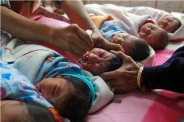  ??  ?? File photo shows a medical worker administer­ing polio drops to an infant at a hospital during the pulse polio immunisati­on programme in Agartala, India. — Reuters photo