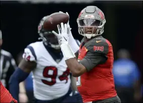  ?? JASON BEHNKEN - THE ASSOCIATED PRESS ?? FILE - In this Dec. 21, 2019, file photo, Tampa Bay Buccaneers quarterbac­k Jameis Winston (3) throws a pass during the first half of an NFL football game against the Houston Texans in Tampa, Fla.