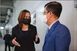 ?? (AP/Evelyn Hockstein) ?? U.S. Vice President Kamala Harris speaks with National Institute of Hygiene and Epidemiolo­gy Director Dang Duc Anh on Thursday during her visit to the institute in Hanoi, Vietnam, where 270,000 doses of the Pfizer vaccine arrived earlier in the morning.