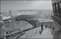  ?? The Associated Press ?? GLOBAL WARMING EFFECT: The Finnish icebreaker MSV Nordica sails through ice floating on the Chukchi Sea off the coast of Alaska on Sunday, while traversing the Arctic's Northwest Passage where global warming is melting sea ice and glaciers at a...