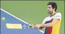  ?? AFP PHOTO ?? After winning the title, Gilles Simon smashes balls into the stands.