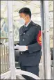  ?? REUTERS ?? A staff member stands inside a closed subway station in Beijing, China.