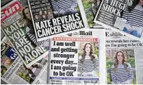  ?? JUSTIN TALLIS / AFP / GETTY IMAGES / TNS ?? The front pages of Britain’s newspapers were dominated by stories about Britain’s Catherine, Princess of Wales, announcing her cancer diagnosis, on March 23.