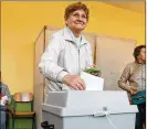  ??  ?? Hungarians cast their ballots after waiting in long lines Sunday in Budapest. In all, 199 parliament­ary seats were at stake, in addition to the prime minister’s seat.