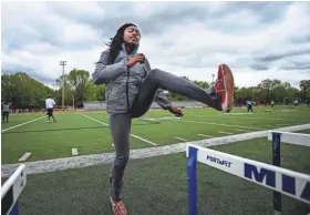  ?? MARK WEBER/THE COMMERCIAL APPEAL USA TODAY NETWORK – TENNESSEE ?? Whitehaven track standout Kiara Rhodes, who runs the 100-meter hurdles, takes part in drills during a recent practice at the high school.