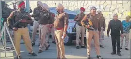  ?? HT PHOTO ?? Police stand guard at the path leading to the air force base in Pathankot after they received a tipoff about a possible terror attack on Tuesday.