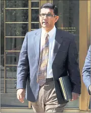  ?? RICHARD DREW— THE ASSOCIATED PRESS ?? Dinesh D’Souza, who was pardoned by President Donald Trump Thursday, characteri­zed prosecutor­s in his case as a “team of goons.”