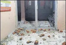  ?? HT PHOTO ?? The vandalised Khemkaran police station in Tarn Taran after the clash on Wednesday night.