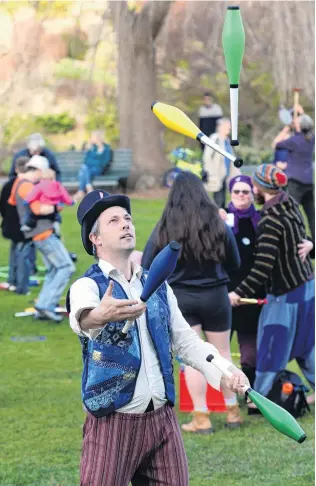  ?? PHOTO: LINDA ROBERTSON ?? Happy celebratio­n . . . Dunedin Fire and Circus Club president Miguel Nitis demonstrat­es his juggling skills at the Dunedin Botanic Garden on Saturday.