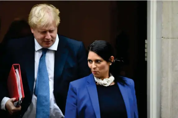  ?? (Getty) ?? Politics and campaignin­g, not the addressing of real issues, appear the top priorities for Boris Johnson and Priti Patel